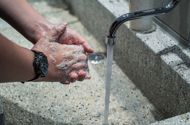 Washing hands is one of the tips on how to clean and disinfect your space during cold and flu season.